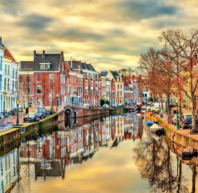 Historic Dutch houses reflected in a peaceful canal